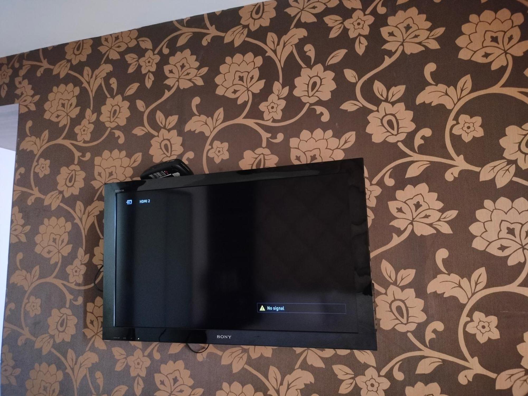 Holiday Inn Chandigarh Panchkula, An Ihg Hotel Exteriör bild A television mounted on a wall